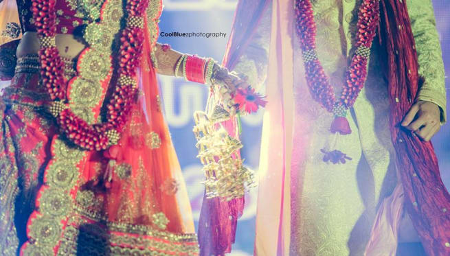 Couple Holding Hands Together