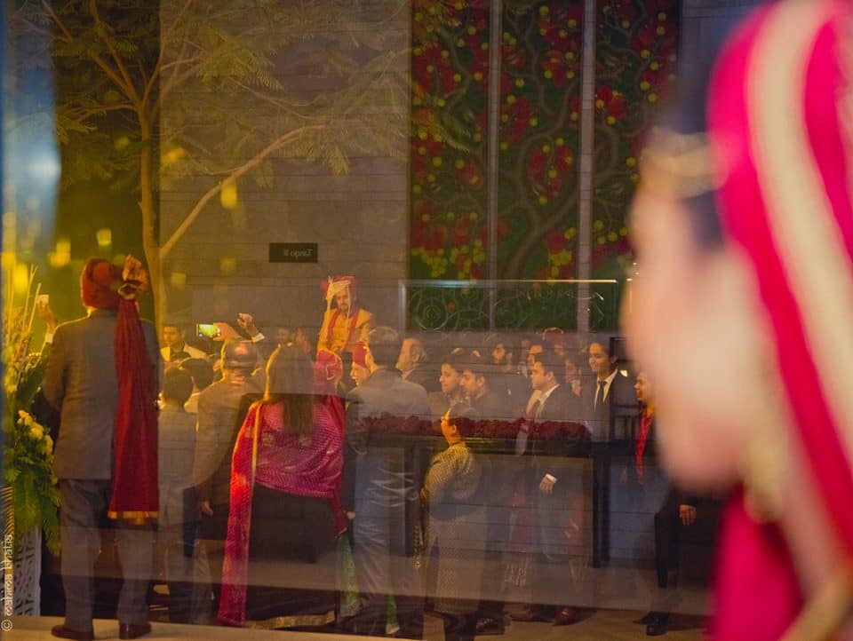 bride watching people:mahima bhatia photography