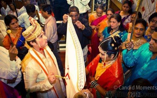 Candid Moments Photographers and Videographers weddingplz