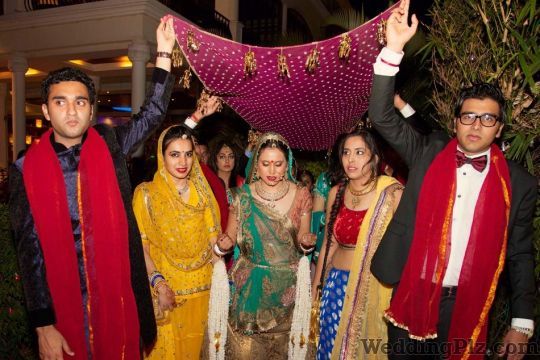 Romesh Dhamija Production Photographers and Videographers weddingplz
