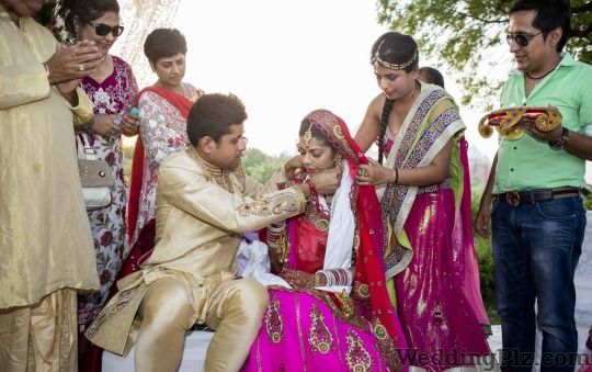 Romesh Dhamija Production Photographers and Videographers weddingplz