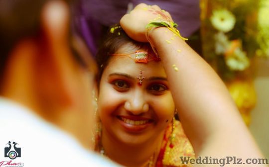 PhotoExit Photographers and Videographers weddingplz