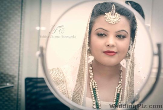 Tuhina Chopra Photoworks Photographers and Videographers weddingplz