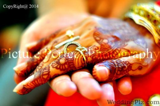 Frozen Memoriess Photographers and Videographers weddingplz