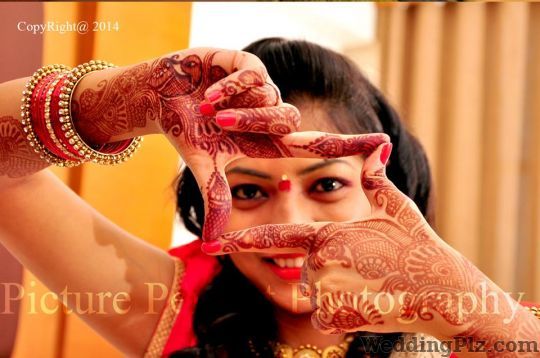 Frozen Memoriess Photographers and Videographers weddingplz