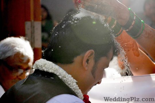 Frozen Times Photographers and Videographers weddingplz