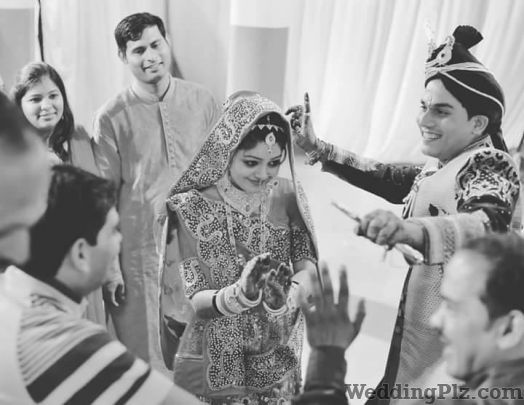 Photographiks Photographers and Videographers weddingplz