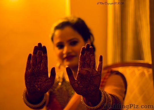Photographiks Photographers and Videographers weddingplz
