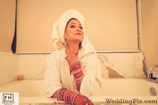 Folio Haus Photographers and Videographers weddingplz