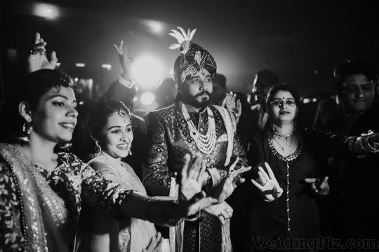 Man With A Camera Photographers and Videographers weddingplz
