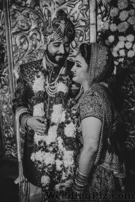 Man With A Camera Photographers and Videographers weddingplz