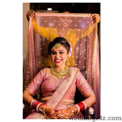 PhotoMan Photographers and Videographers weddingplz