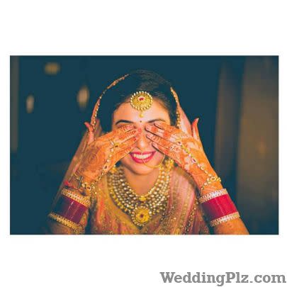PhotoMan Photographers and Videographers weddingplz
