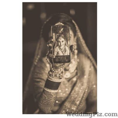 PhotoMan Photographers and Videographers weddingplz