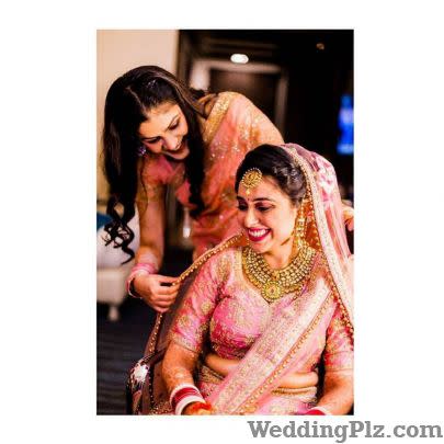 PhotoMan Photographers and Videographers weddingplz