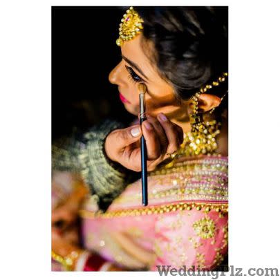 PhotoMan Photographers and Videographers weddingplz