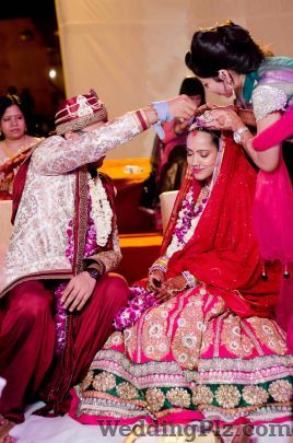 Candid Photographics Photographers and Videographers weddingplz