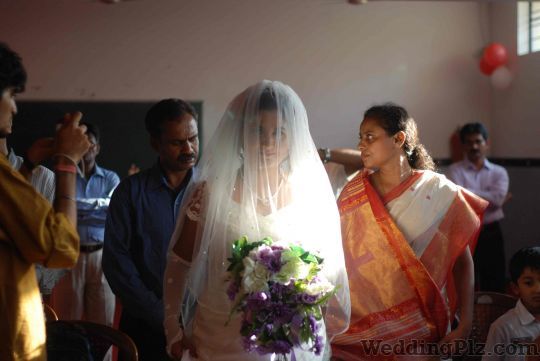 Candid Photographics Photographers and Videographers weddingplz