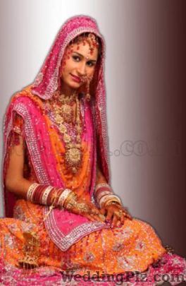 Studio 11 Photographers and Videographers weddingplz