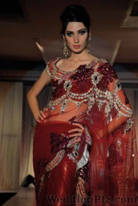 Rakhi and Tarak Wedding Lehnga and Sarees weddingplz