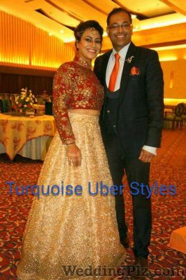 Turquoise Uber Styles Wedding Lehnga and Sarees weddingplz