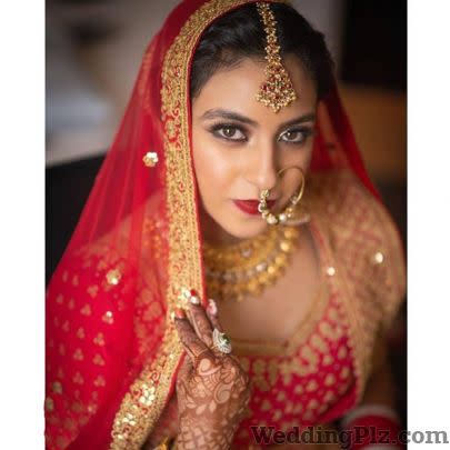 Swati Ubroi Wedding Lehnga and Sarees weddingplz
