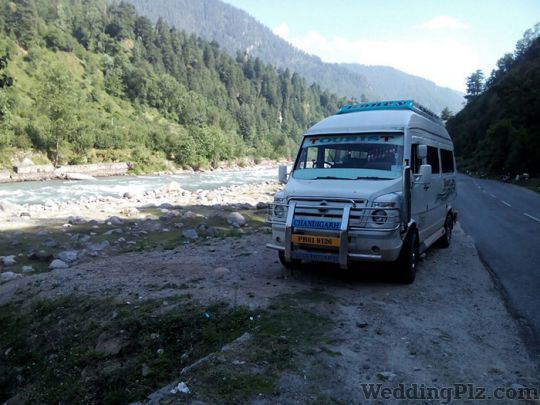 Guri Tempo Traveller Chandigarh Taxi Services weddingplz