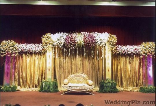 Banzer Blossoms And Creens Decorators weddingplz